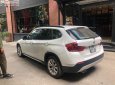 BMW X1 2011 - Chính chủ bán BMW X1 màu trắng, đời 2011, đăng ký lần đầu T7/2012, chạy 7,8 vạn