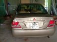 Mitsubishi Lancer 2003 - Bán Mitsubishi Lancer sản xuất năm 2003, màu vàng, nhập khẩu