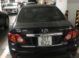 Toyota Corolla altis   2009 - Bán xe Toyota Corolla altis sản xuất năm 2009, màu đen đã đi 200.000 km