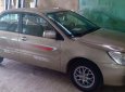 Mitsubishi Lancer 2003 - Bán Mitsubishi Lancer sản xuất năm 2003, màu vàng, nhập khẩu