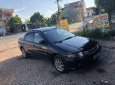 Mazda 323   2000 - Bán Mazda 323 sản xuất năm 2000, màu đen, giá cạnh tranh