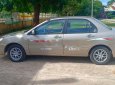 Mitsubishi Lancer 2003 - Bán Mitsubishi Lancer sản xuất năm 2003, màu vàng, nhập khẩu