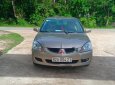 Mitsubishi Lancer 2003 - Bán Mitsubishi Lancer sản xuất năm 2003, màu vàng, nhập khẩu