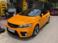 Kia Forte Koup  1.6 AT 2009 - Bán Kia Forte Koup 1.6 AT đời 2009, màu vàng, nhập khẩu  