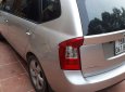 Kia Carens   2.0AT 2009 - Bán Kia Carens 2.0AT đời 2009, màu bạc, xe nhập 