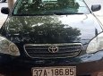 Toyota Corolla altis 2004 - Gia đình bán Toyota Corolla altis sản xuất năm 2004, màu đen