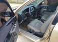 Ford Laser  1.8 2002 - Bán Ford Laser 1.8 sản xuất 2002, màu vàng, giá 145tr