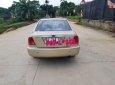 Ford Laser  1.8 2002 - Bán Ford Laser 1.8 sản xuất 2002, màu vàng, giá 145tr