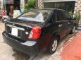 Daewoo Lacetti 2011 - Cần bán lại xe Daewoo Lacetti sản xuất năm 2011, màu đen 