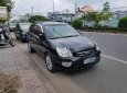 Kia Carens 2010 - Bán Kia Carens sản xuất 2010, màu đen số sàn  