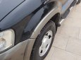 Ford Escape 2003 - Bán ô tô Ford Escape năm 2003, màu đen số sàn