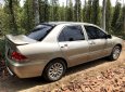 Mitsubishi Lancer   2005 - Chính chủ bán Mitsubishi Lancer đời 2005, màu vàng, nhập khẩu nguyên chiếc