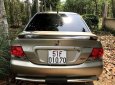 Mitsubishi Lancer   2005 - Chính chủ bán Mitsubishi Lancer đời 2005, màu vàng, nhập khẩu nguyên chiếc