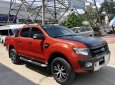 Ford Ranger Wildtrak 2.2L 4x2 AT 2013 - Cần bán xe Ford Ranger Wildtrak 2.2L 4x2 AT đời 2013, màu cam, nhập khẩu giá cạnh tranh