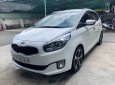 Kia Rondo GAT 2.0AT 2016 - Bán xe Kia Rondo GAT 2.0AT năm 2016, màu trắng, biển SG