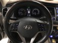 Hyundai Tucson 1.6 Turbo 2017 - Bán Hyundai Tucson 1.6 Turbo màu trắng camay, máy xăng, số tự động, sản xuất 12/2017, một chủ đi 29000km