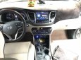 Hyundai Tucson 1.6 Turbo 2017 - Bán Hyundai Tucson 1.6 Turbo màu trắng camay, máy xăng, số tự động, sản xuất 12/2017, một chủ đi 29000km
