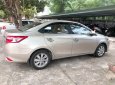 Toyota Vios 2015 - Cần bán Toyota Vios đời 2015, màu vàng, xe gia đình giá cạnh tranh