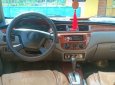 Mitsubishi Lancer 2004 - Gia đình bán xe Mitsubishi Lancer SX 2004, màu nâu, nhập khẩu