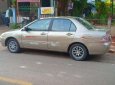 Mitsubishi Lancer 2004 - Gia đình bán xe Mitsubishi Lancer SX 2004, màu nâu, nhập khẩu