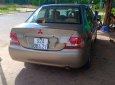 Mitsubishi Lancer 2004 - Gia đình bán xe Mitsubishi Lancer SX 2004, màu nâu, nhập khẩu