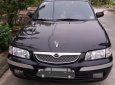 Mazda 626    1999 - Chính chủ bán xe Mazda 626 đời 1999, màu đen giá cạnh tranh