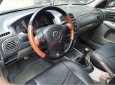 Mazda 323  GLX   2003 - Bán Mazda 323 GLX 2003, màu đỏ, xe gia đình