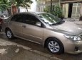 Toyota Corolla   2013 - Bán Toyota Corolla đời 2013, màu ghi vàng 