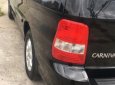 Kia Carnival GS 2006 - Bán xe Kia Carnival GS năm 2006, màu đen, xe gia đình chính chủ sử dụng, dòng xe hạng sang cao cấp