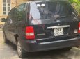 Kia Carnival   2009 - Cần bán Kia Carnival sản xuất năm 2009, màu đen, số tự động