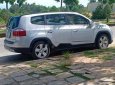 Chevrolet Orlando 2012 - Cần bán gấp Chevrolet Orlando sản xuất 2012, màu bạc