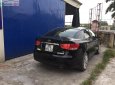 Kia Forte SX 1.6 AT 2010 - Cần bán lại xe Kia Forte SX 1.6 AT đời 2010, màu đen, giá tốt