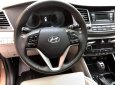 Hyundai Tucson 2.0AT 2016 - Bán Hyundai Tucson 2.0AT đời 2016, màu nâu, nhập khẩu 