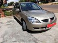 Mitsubishi Lancer 2004 - Bán Mitsubishi Lancer đời 2004, màu vàng, xe nhập xe gia đình