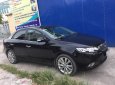 Kia Forte SX 1.6 AT 2010 - Cần bán lại xe Kia Forte SX 1.6 AT đời 2010, màu đen, giá tốt