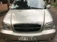 Kia Carnival 2009 - Bán Kia Carnival sản xuất năm 2009, màu vàng cát