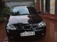 Chevrolet Lacetti   2004 - Bán Chevrolet Lacetti sản xuất 2004, màu đen