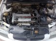 Mazda 323 1.6 2000 - Gia đình bán Mazda 323 1.6 đời 2000, màu trắng, xe nhập