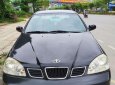 Daewoo Lacetti EX 2005 - Nhà bán Daewoo Lacetti EX đời 2005, màu đen số sàn