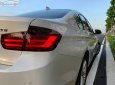 BMW 3 Series   2014 - Bán BMW 320i đời 2014, màu trắng, nhập khẩu  