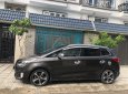 Kia Rondo GATH 2016 - Cần bán gấp Kia Rondo GATH đời 2016, màu nâu, đã đi 50000km, 555 triệu