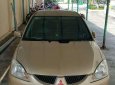 Mitsubishi Lancer 2004 - Cần bán lại xe Mitsubishi Lancer đời 2004, màu vàng xe gia đình, giá chỉ 230 triệu