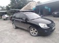 Kia Carens   2009 - Cần bán gấp Kia Carens 2009, màu đen, nhập khẩu ít sử dụng