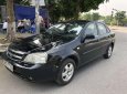 Daewoo Lacetti 2009 - Cần bán xe Daewoo Lacetti sản xuất năm 2009, màu đen xe gia đình, giá tốt