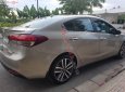 Kia Cerato 2016 - Cần bán lại xe Kia Cerato sản xuất năm 2016, màu vàng chính chủ