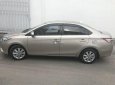 Toyota Vios 2016 - Cần bán lại xe Toyota Vios đời 2016, màu vàng, 433.3tr