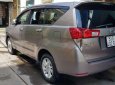 Toyota Innova E 2017 - Bán Toyota Innova E đời 2017, màu đồng ánh kim