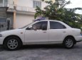 Mazda 323 1997 - Cần bán Mazda 323 đời 1997, màu trắng, nhập khẩu nguyên chiếc, 90 triệu