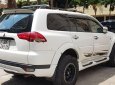 Mitsubishi Pajero Sport G 4x4 2014 - Cần bán xe Mitsubishi Pajero Sport G 4x4 sản xuất 2014, màu trắng chính chủ