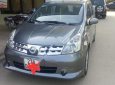 Nissan Grand livina 2010 - Cần bán Nissan Grand livina đời 2010, màu nâu xe gia đình, giá tốt